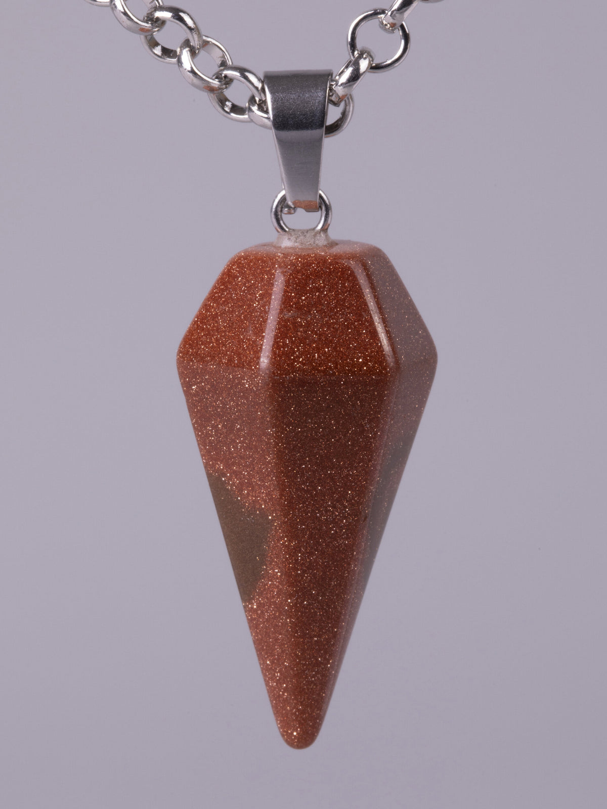 Luxusní amulet ve tvaru masivní špice z hnědého slunečního kamene PK1400-0108
