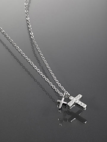 Jemný náhrdelník z chirurgické oceli se dvěma křížky s drobnými čirými krystalky NK1587-0112