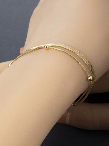 Minimalistický náramek z chirurgické oceli zlatý NM3061-0114