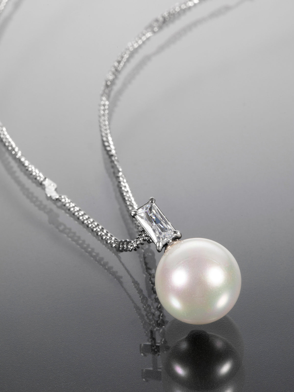 Elegantní náhrdelník z chirurgické oceli s perlou NK1676-0112