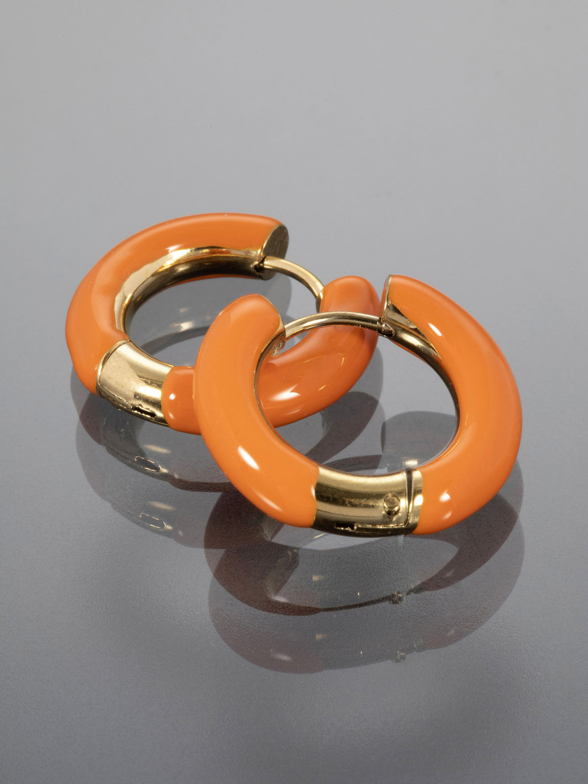 Náušnice z chirurgické oceli oranžové kruhy NE2711-0109