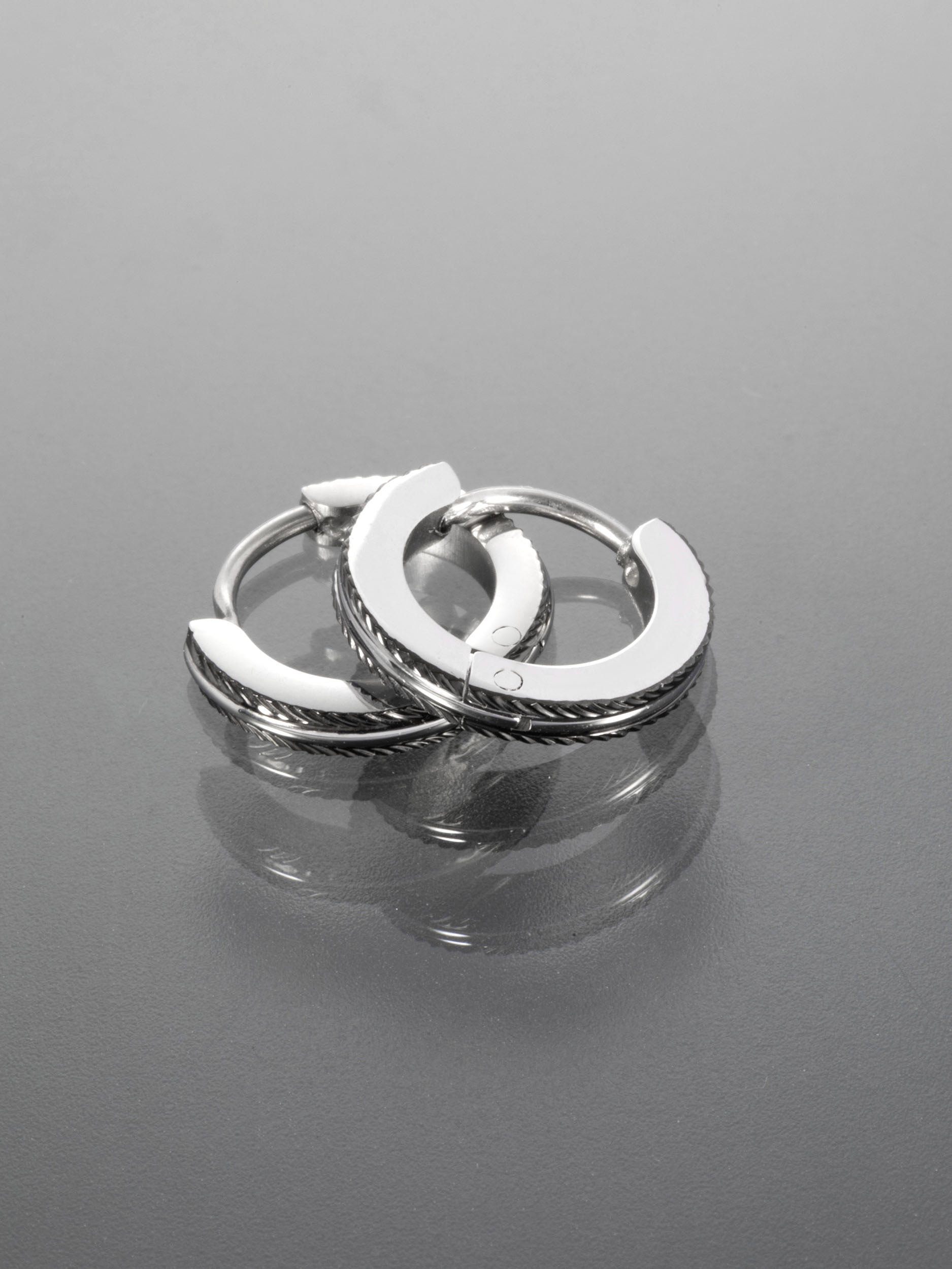 Elegantní náušnice kruhy z chirurgické oceli NE2851-0112