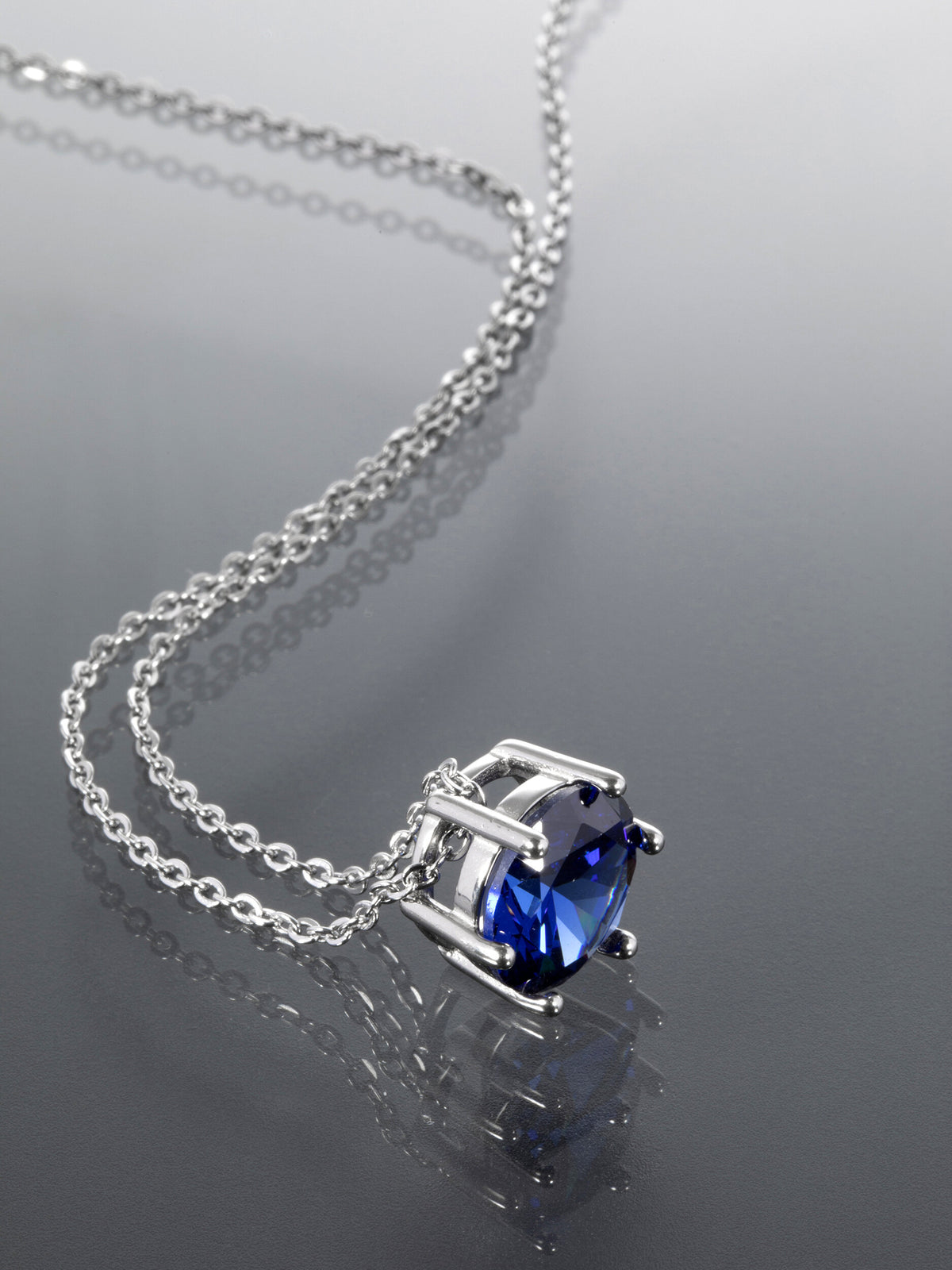 Náhrdelník z chirurgické oceli s modrým zirkonem NK1725-0505