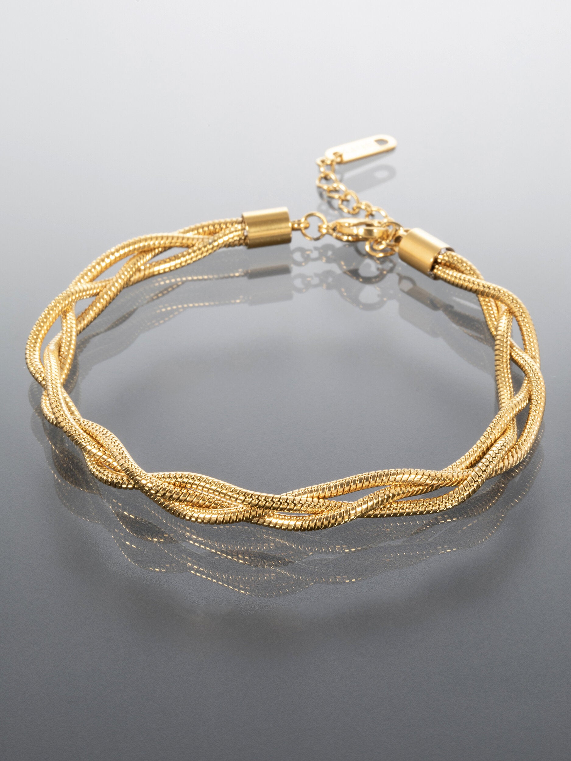 Elegantní náramek z pletených řetízků z chirurgické oceli zlaté NM3188-0114