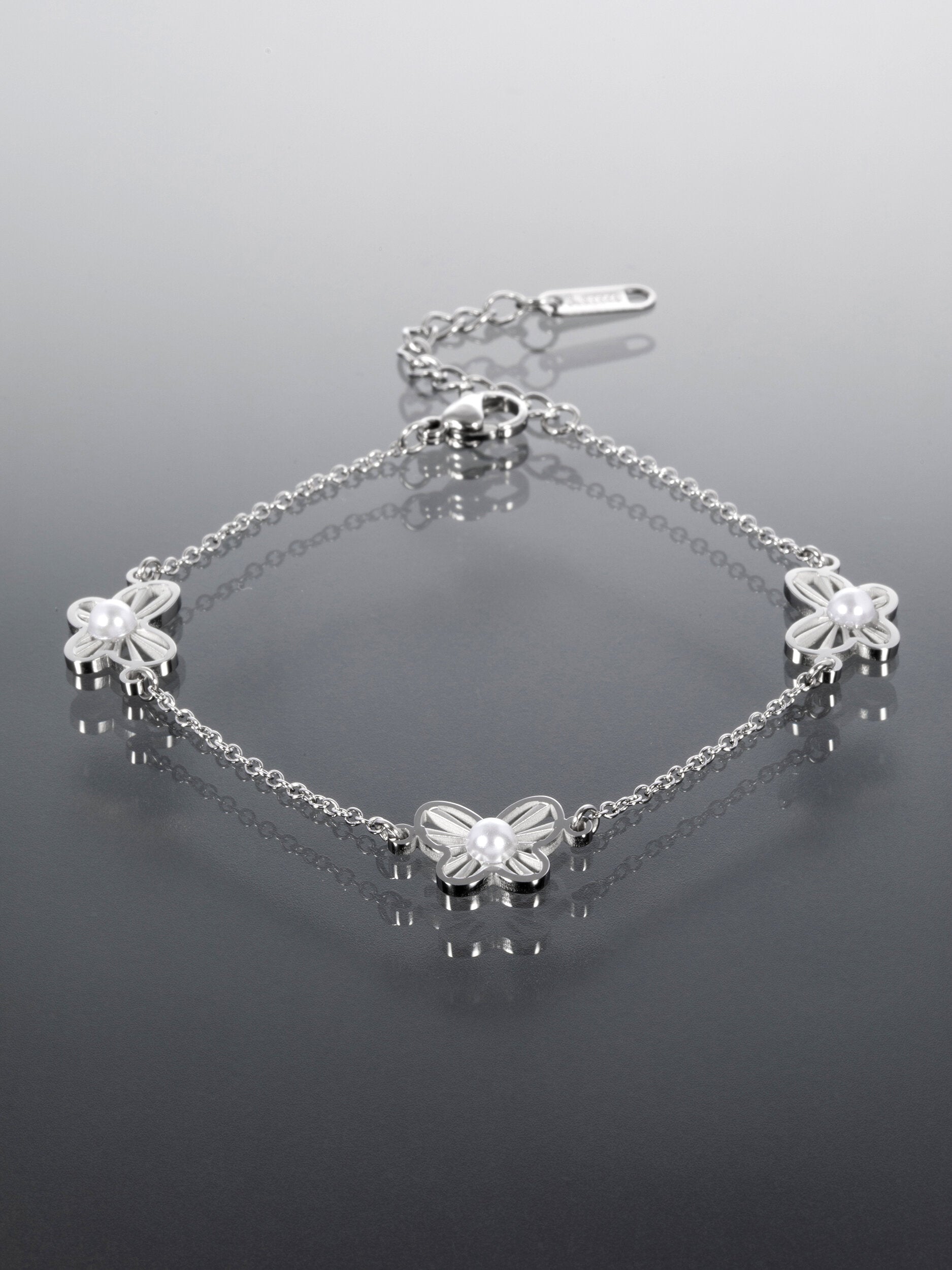 Náramek z chirurgické oceli s motýlky NM3179-0112