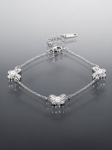 Náramek z chirurgické oceli s motýlky NM3179-0112