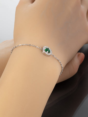 Náramek z chirurgické oceli kolečko se zeleným krystalkem NM3182-0112