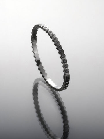 Stylový náramek z chirurgické oceli ozdobený čirými krystalky NM3289-0112