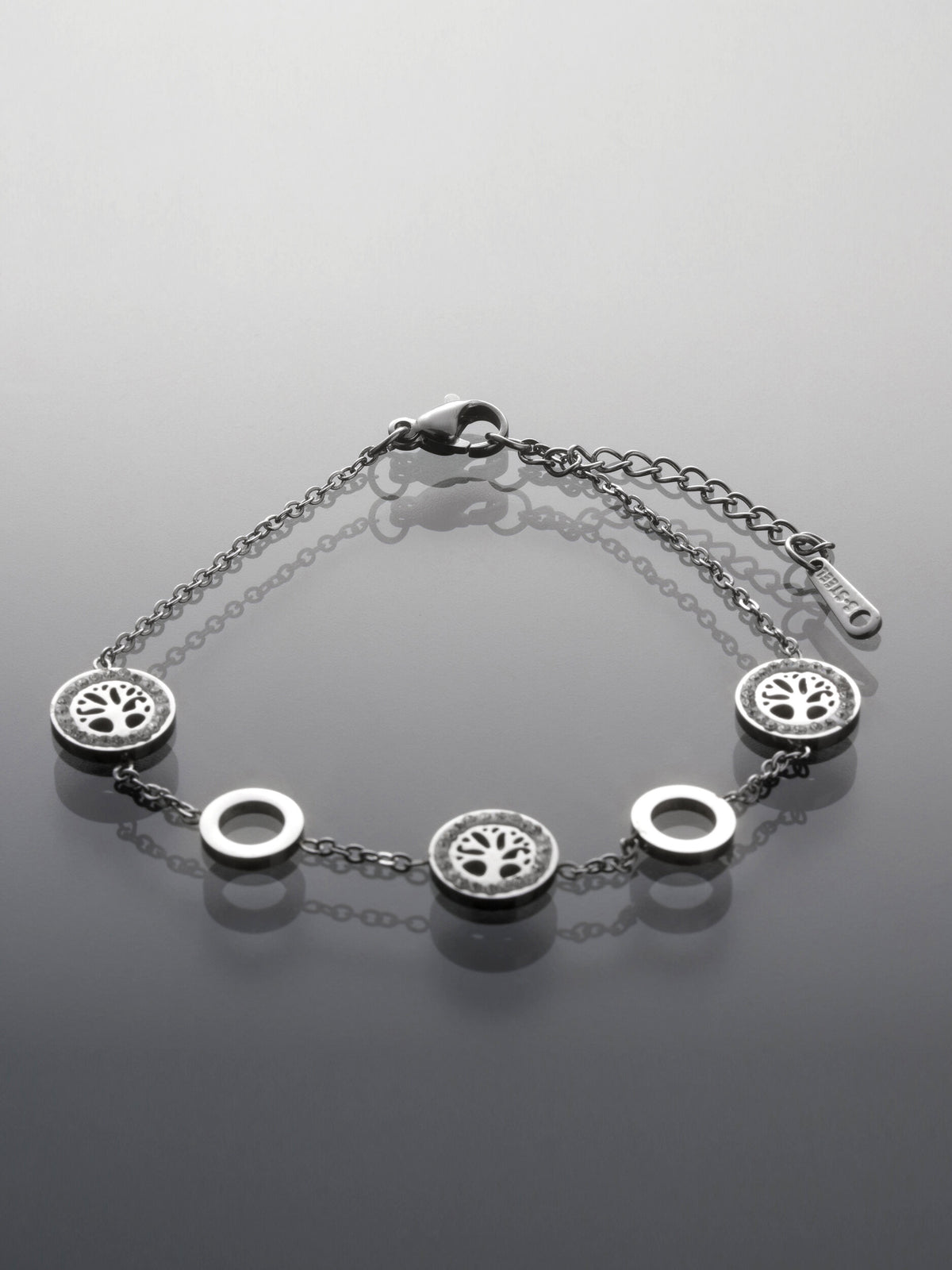 Řetízkový náramek z chirurgické oceli ozdobený kolečky a stromy života  NM3285-0112