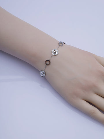 Řetízkový náramek z chirurgické oceli ozdobený kolečky a stromy života  NM3285-0112