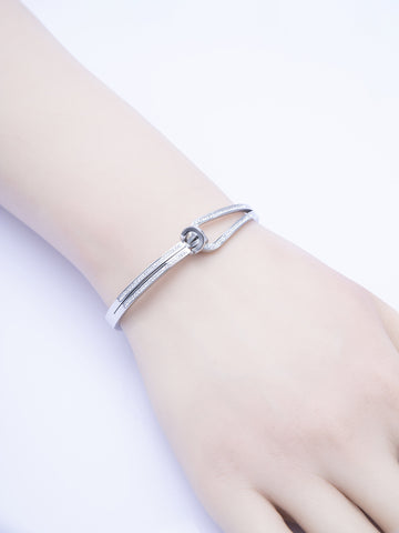 Pevný náramek z leštěné chirurgické oceli s drobnými krystalky uzlík NM3318-0112