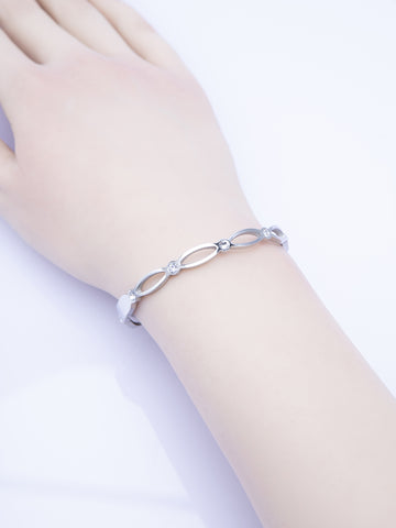 Pevný náramek z leštěné chirurgické oceli s krystaly NM3320-0112