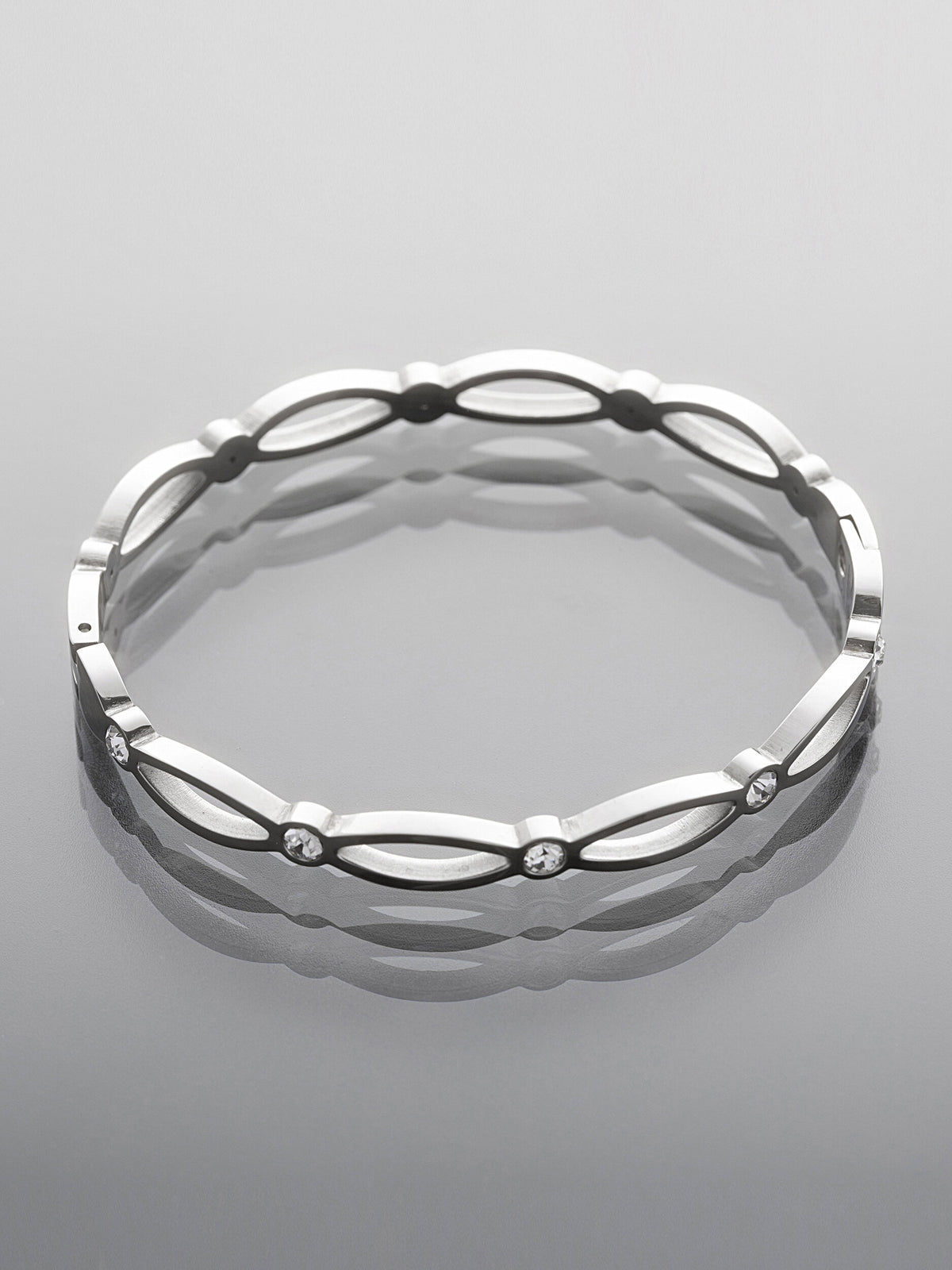 Pevný náramek z leštěné chirurgické oceli s krystaly NM3320-0112