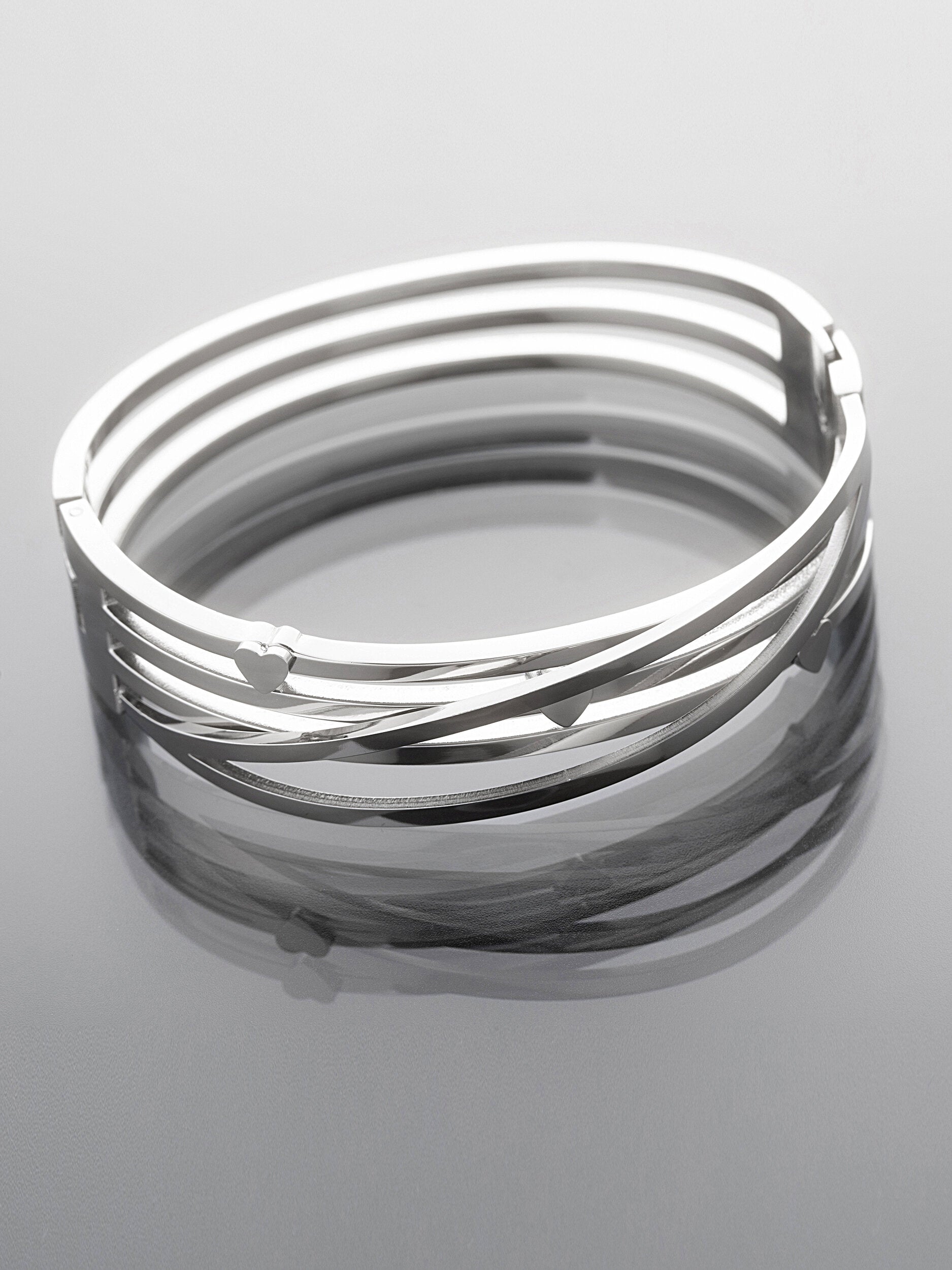 Pevný náramek z leštěné chirurgické oceli z několika pramenů NM3319-0112