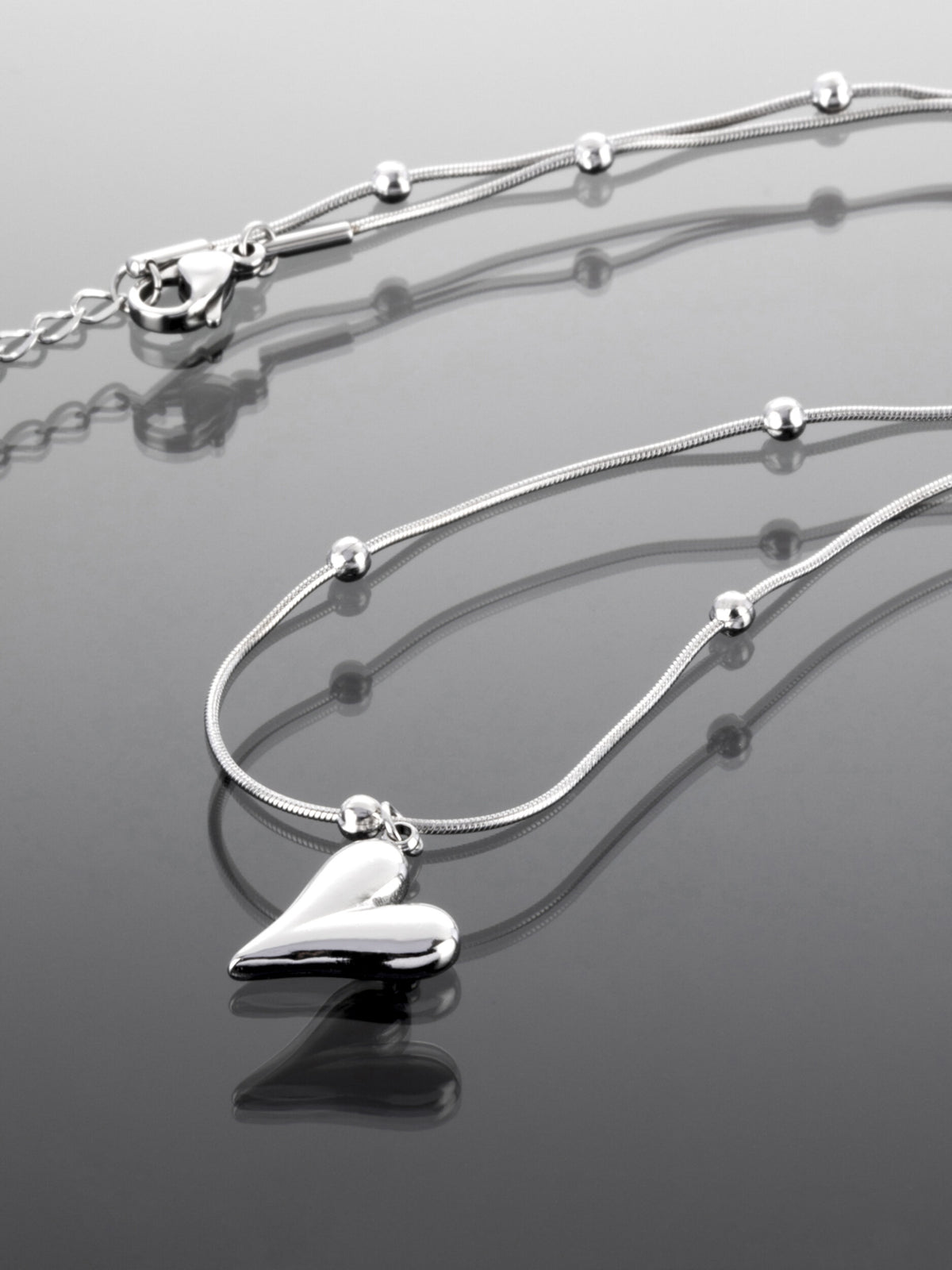 Exkluzivní ocelový náhrdelník ve tvaru podlouhlého srdce NK0672-0107