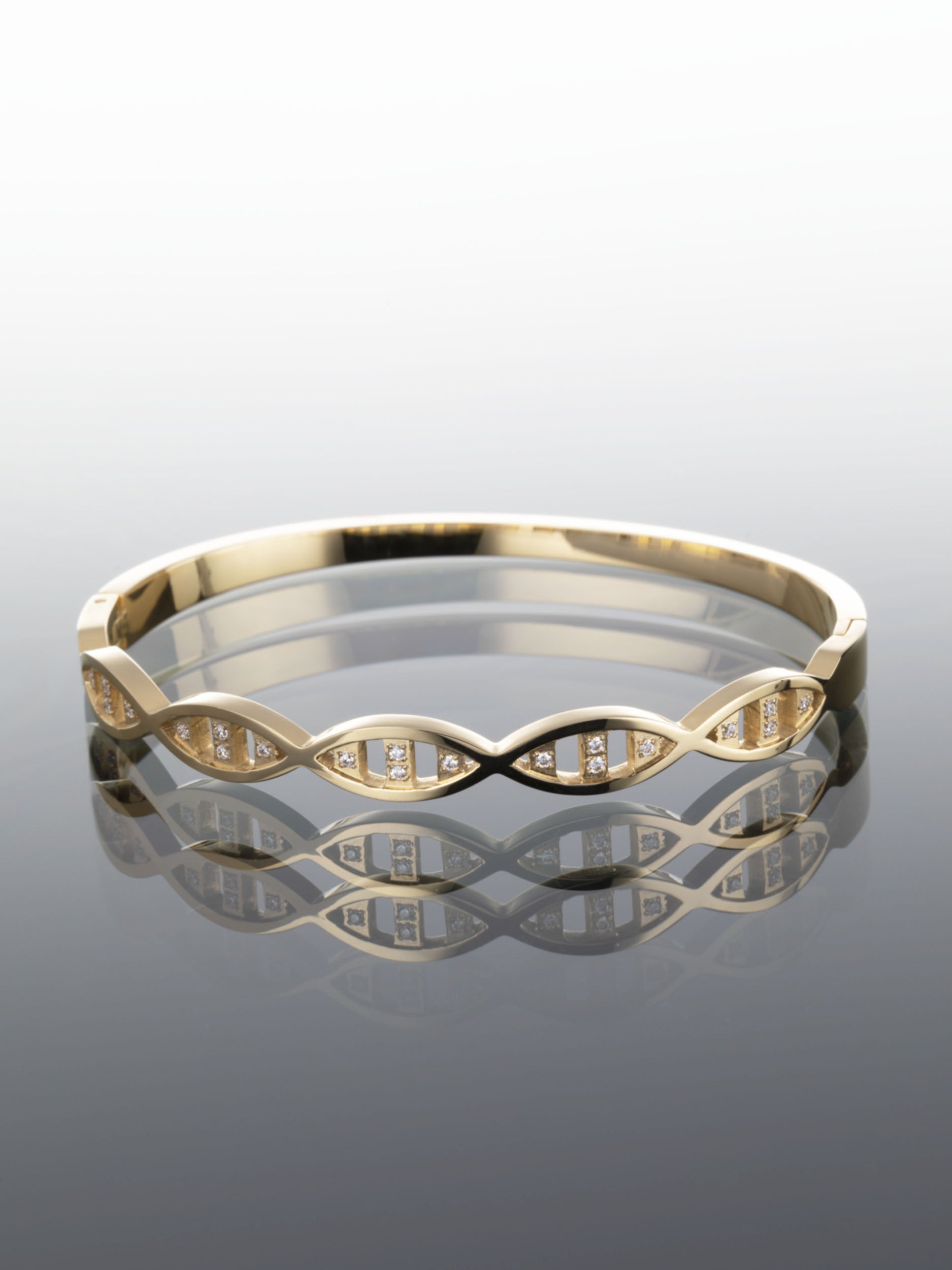 Luxusní náramek z chirurgické oceli ve zlaté barvě s očky zdobenými čirými krystaly  NM1495-0114