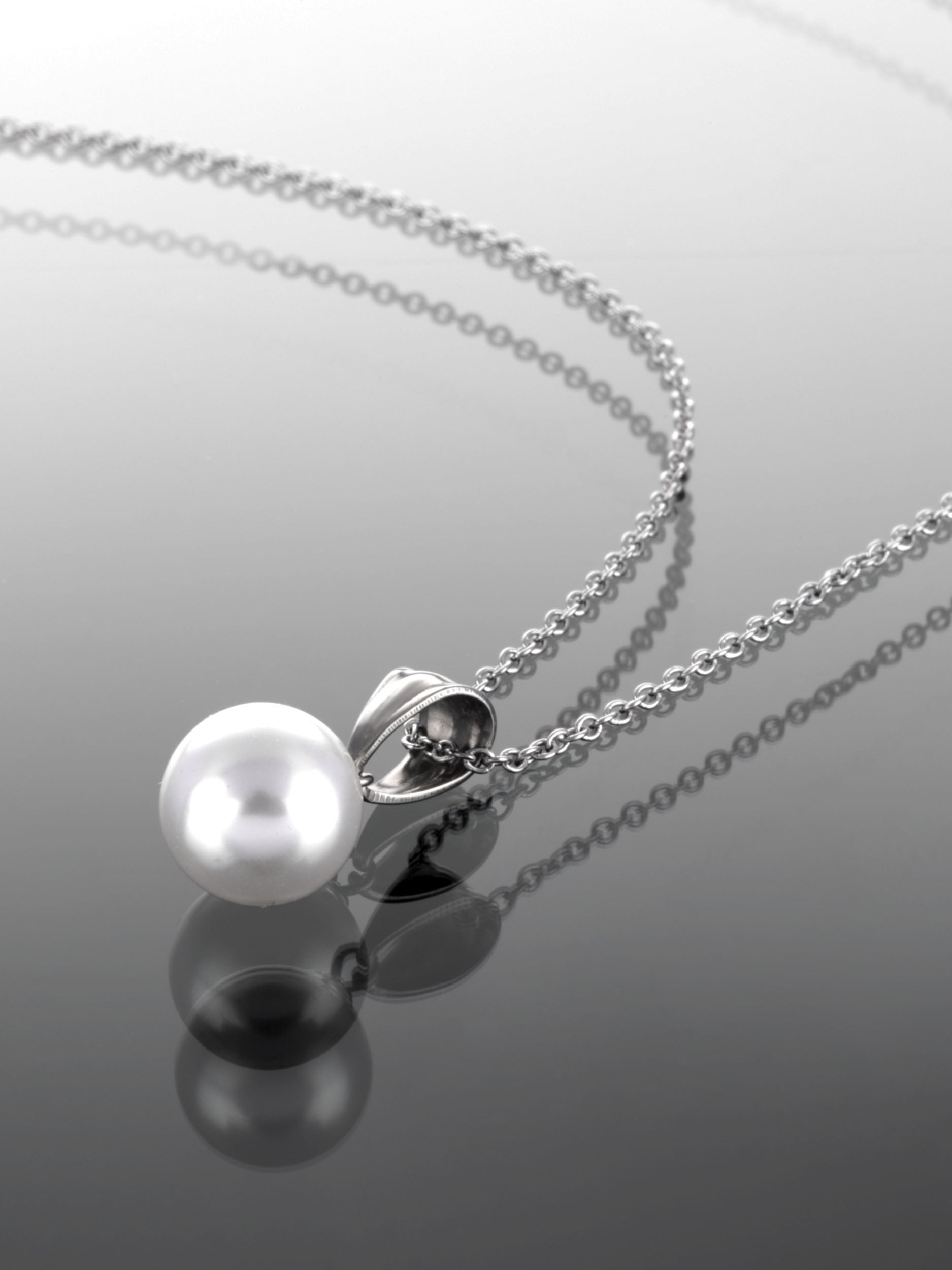 Luxusní ocelový náhrdelník s bílou perlou NK0652-0107