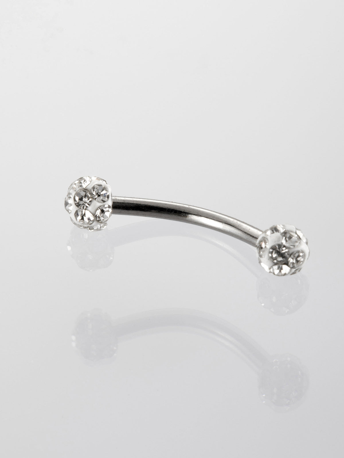 Banánek piercing do obočí s drobnými čirými krystaly z chirurgické oceli VB0021-07