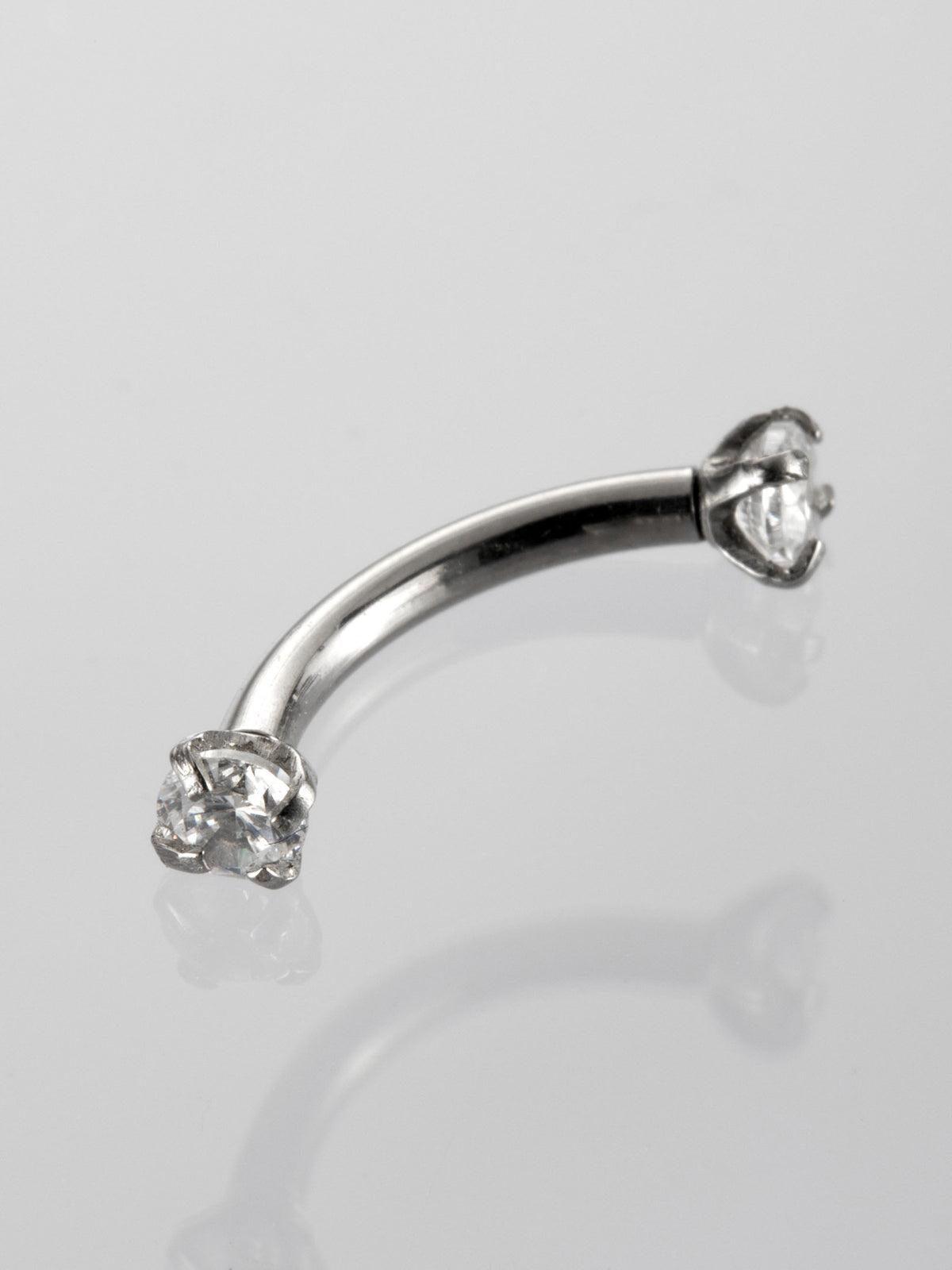 Banánek piercing do obočí s čirými krystaly z chirurgické oceli  VB0022-07