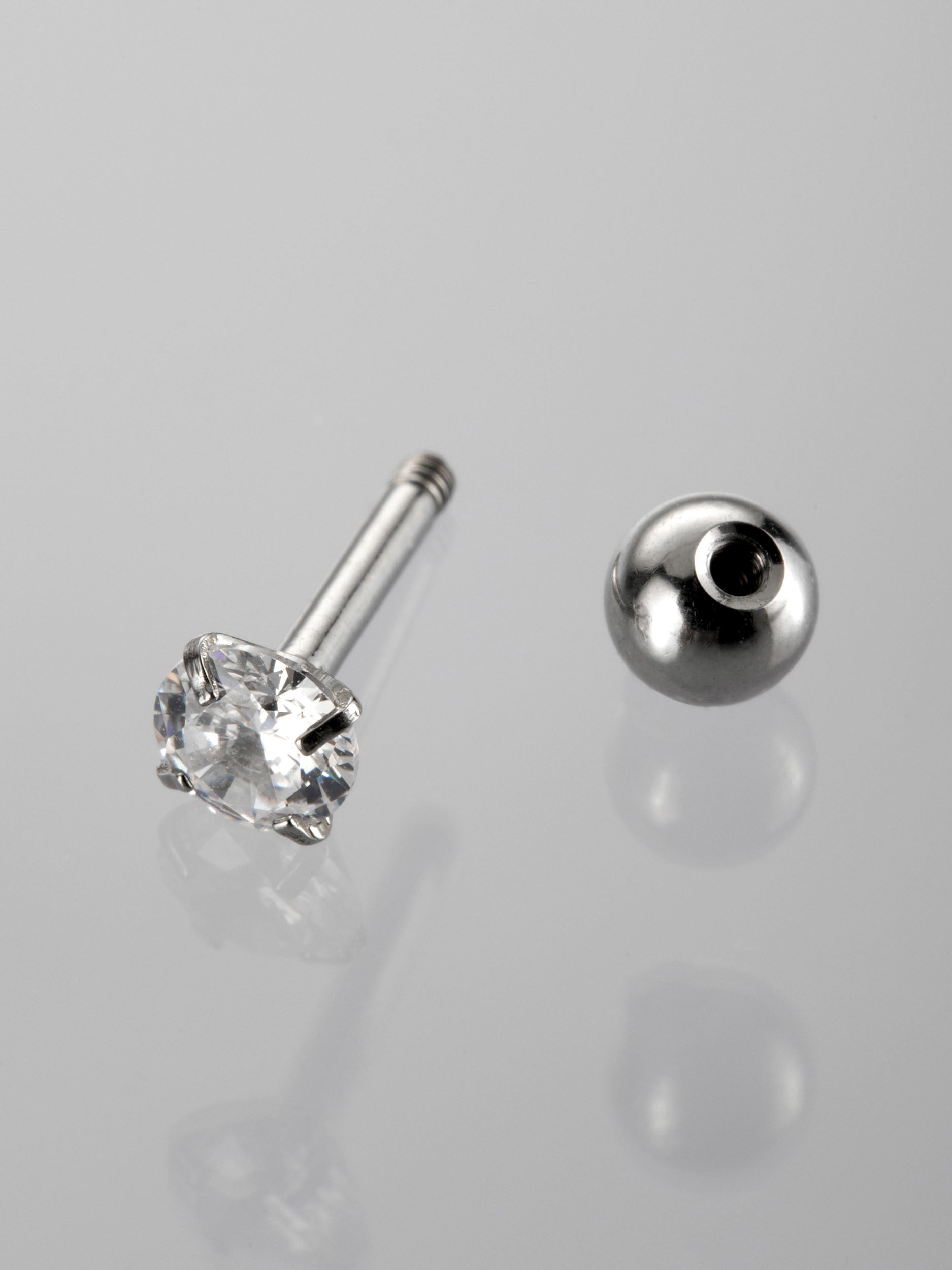 Činka piercing do ucha s kulatým čirým krystalem z chirurgické oceli VB0036-07