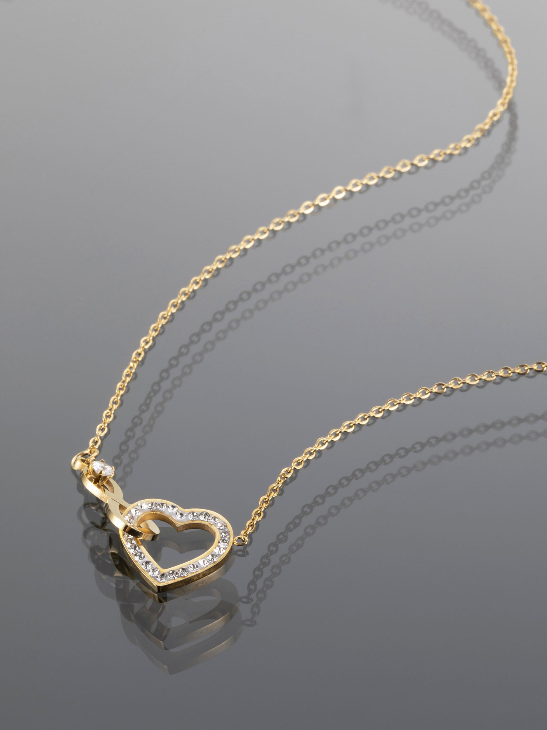 Fashion Icon ocelový náhrdelník s přívěskem ve tvaru nekonečna a srdce NK1080-0112