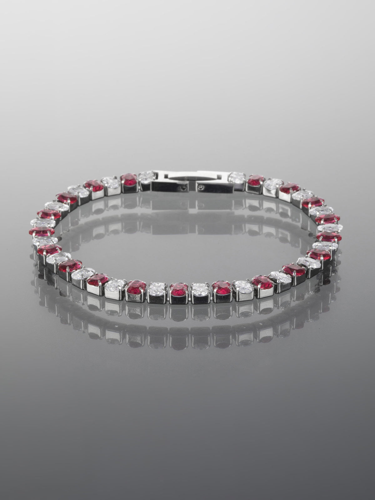 Luxusní náramek z chirurgické oceli s čirými a červenými oválnými krystaly NM2524-0121
