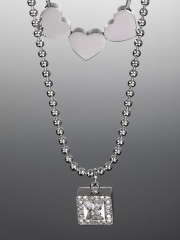 Dvojitý náhrdelník z chirurgické oceli se srdíčky a výrazným čirým krystalem  NK1202-0112