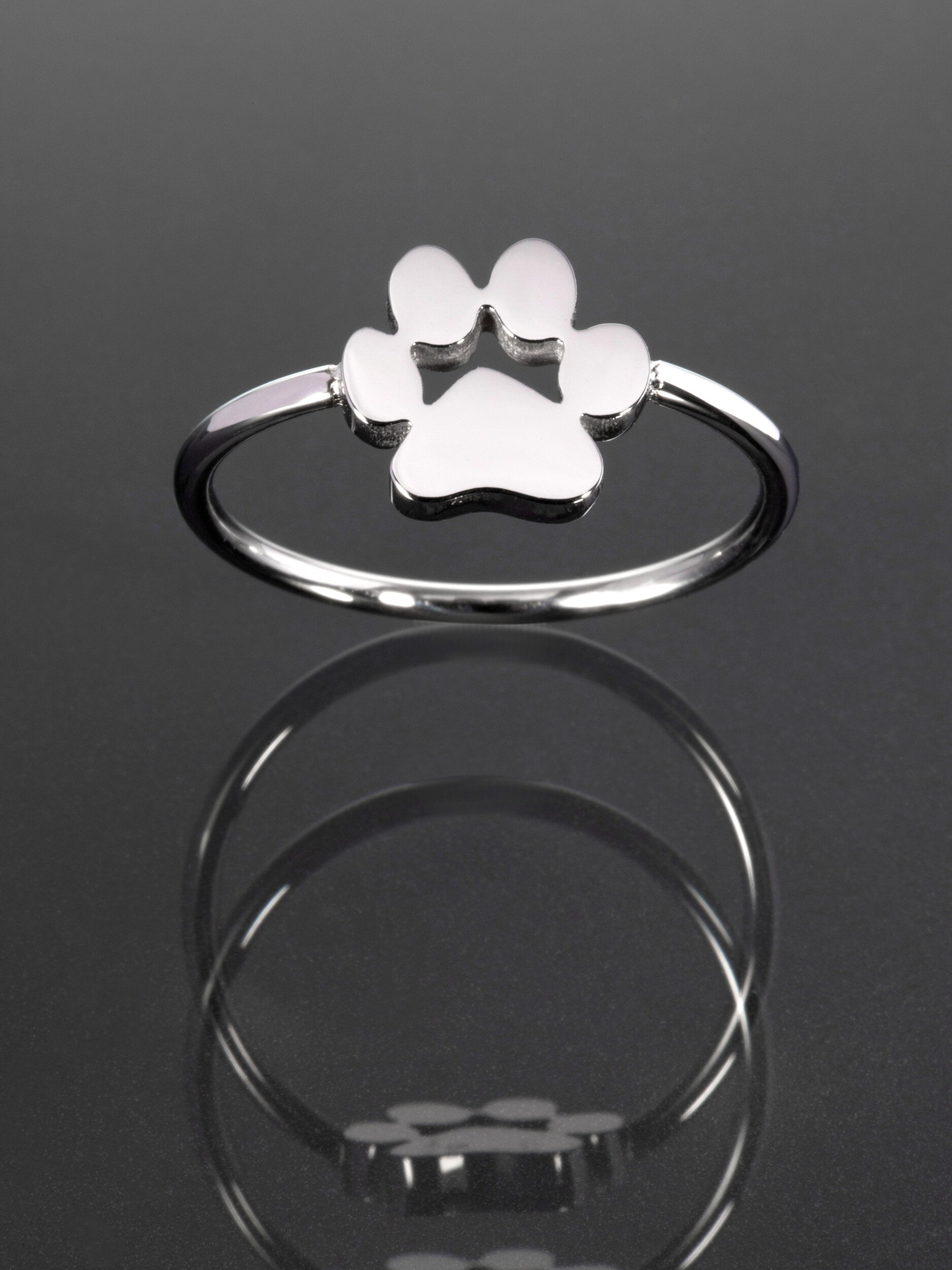 Krásný moderní prstýnek z chirurgické oceli s tlapkou  PR0355-015312