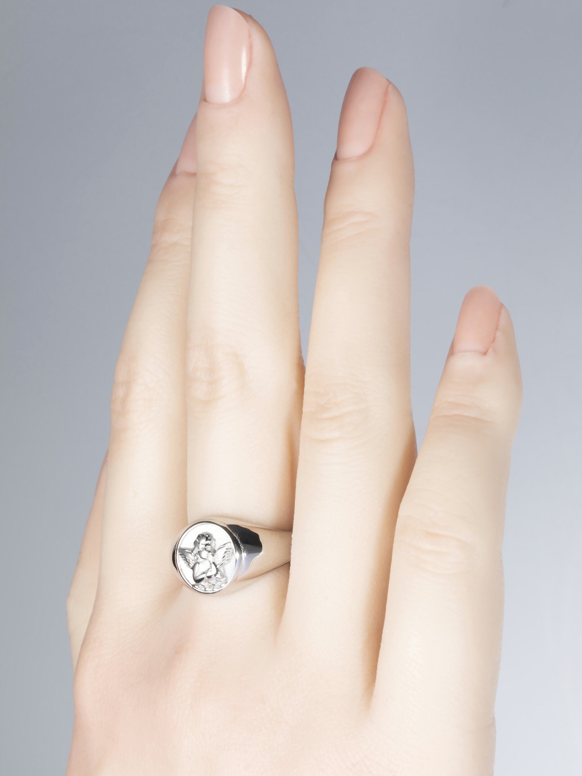 Krásný moderní prstýnek z chirurgické oceli s andílkem  PR0357-016112