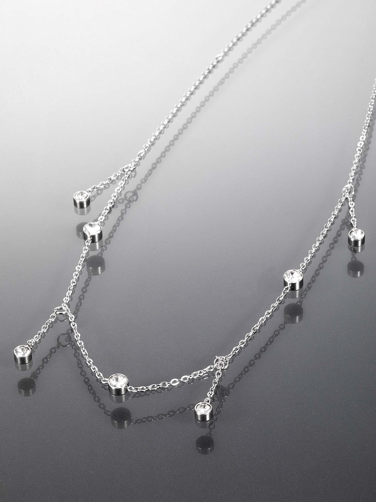 Luxusní jemný náhrdelník z leštěné chirurgické oceli s přívěškem a pecičkami s krystaly NK1352-0107