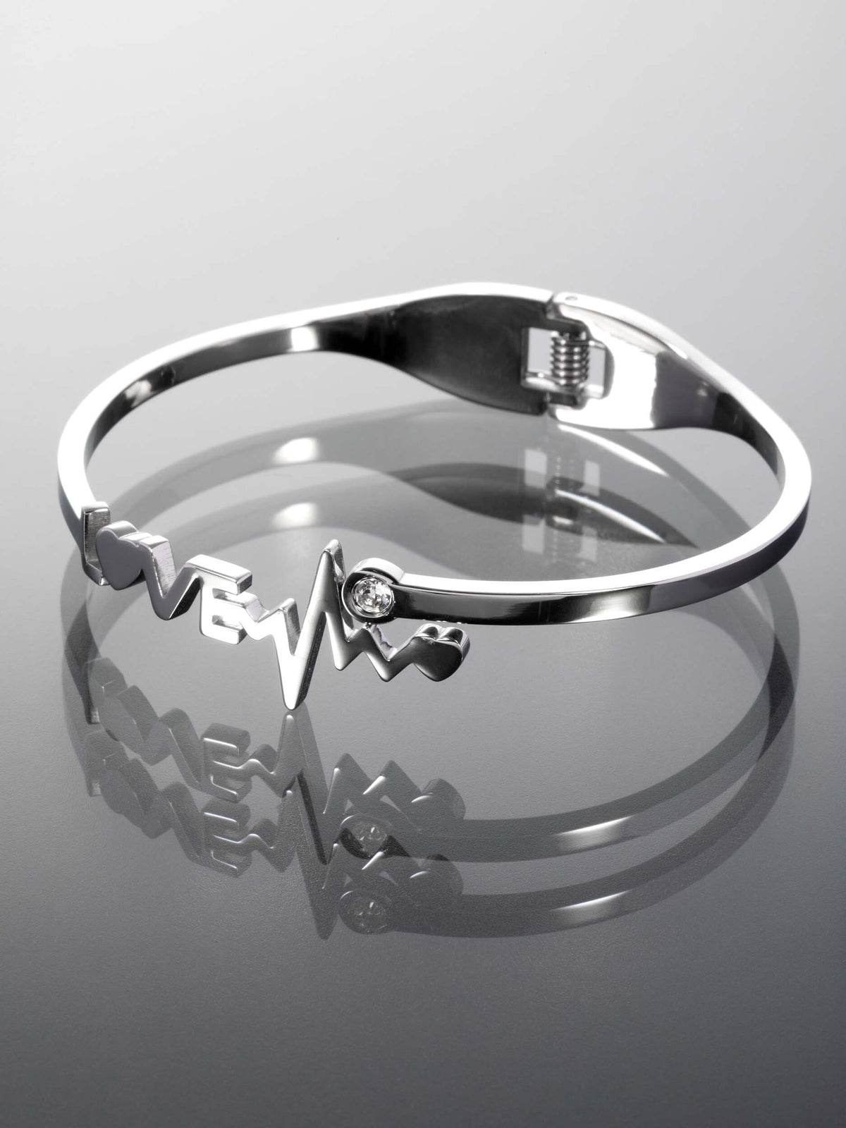 Stylový pevný náramek z leštěné chirurgické oceli s nápisem LOVE NM2723-0107