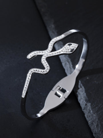 Krásný pevný náramek z chirurgické oceli ve tvaru hada s drobnými čirými krystaly  NM2718-0107