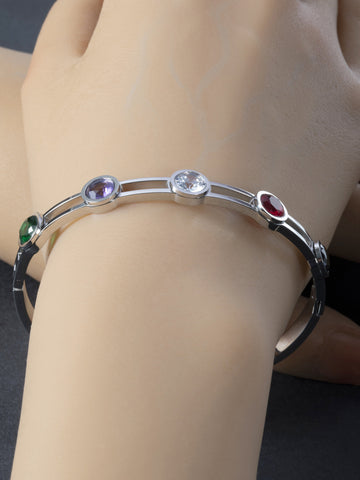 Elegantní pevný náramek z chirurgické oceli zdobený barevnými třpytivými krystaly NM2734-0107