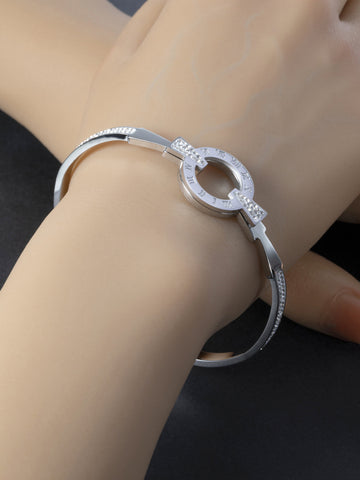 Elegantní pevný náramek z chirurgické oceli zdobený třpytivými krystaly  NM2737-0107